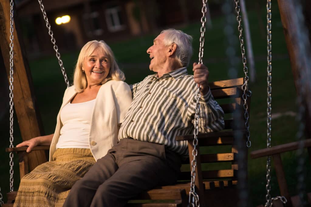 couple on porch swing evening 2023 11 27 05 14 28 utc